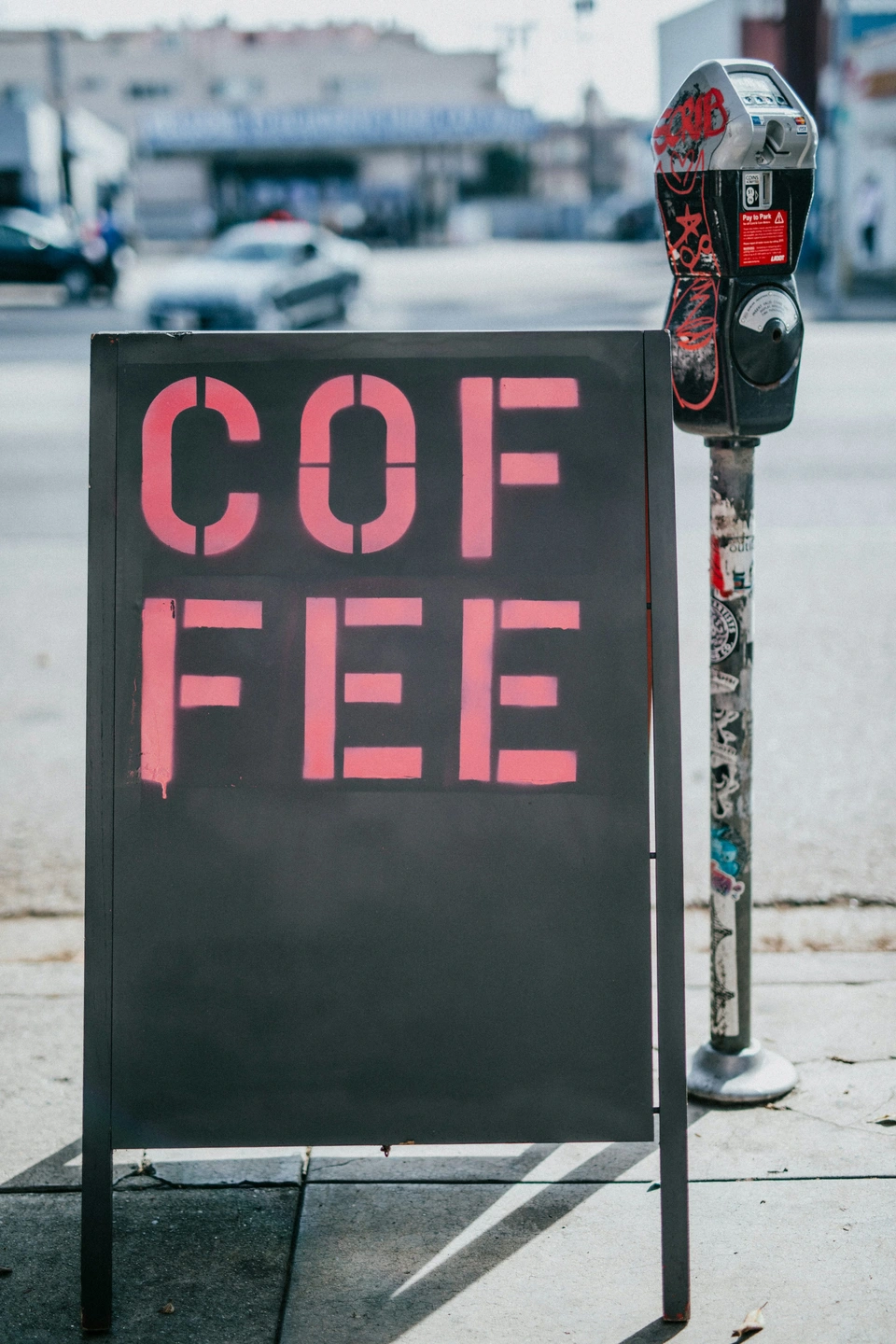 Before: Pink COFFEE sidewalk sign